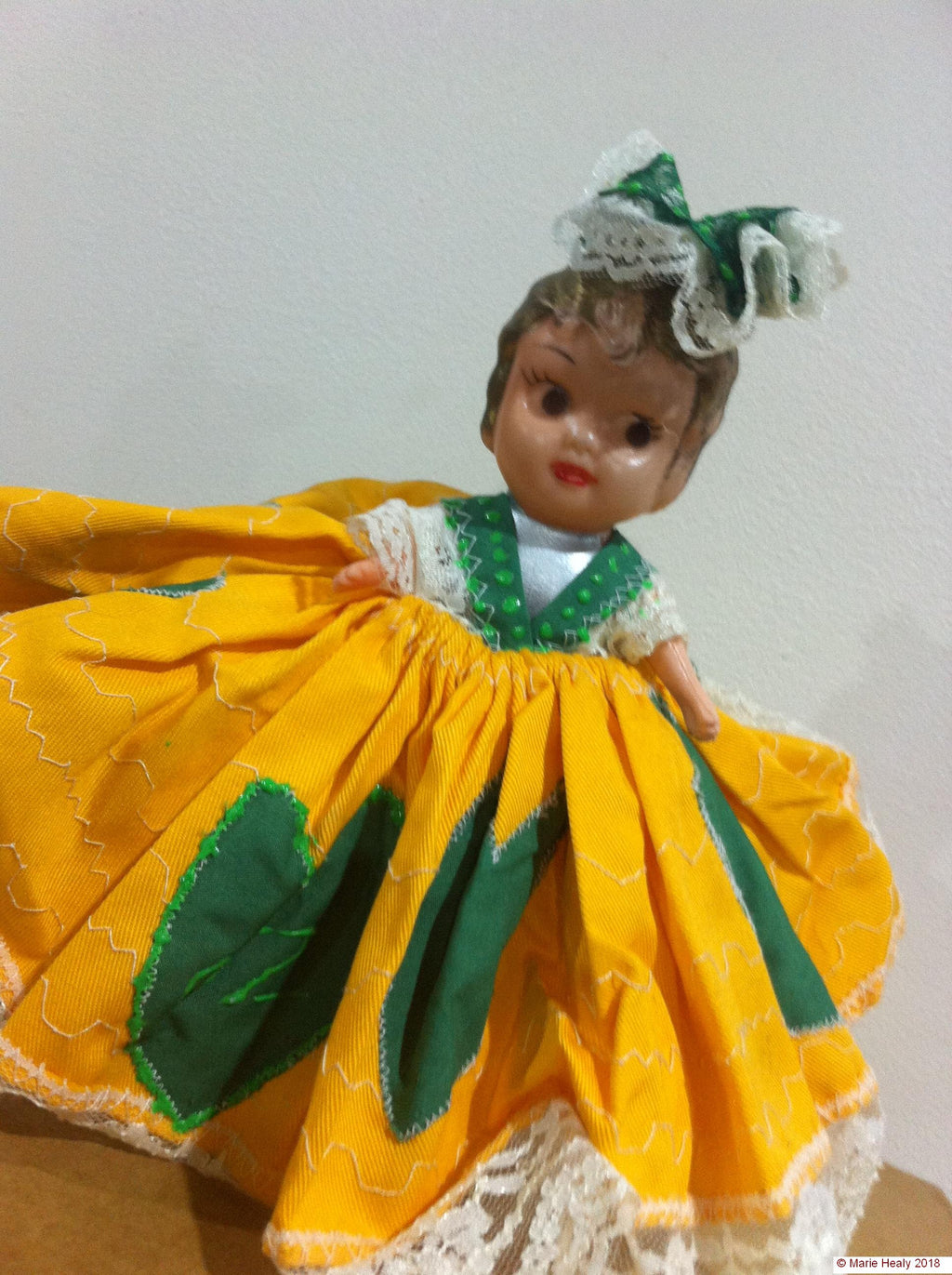 Kewpie Doll in Green and Gold