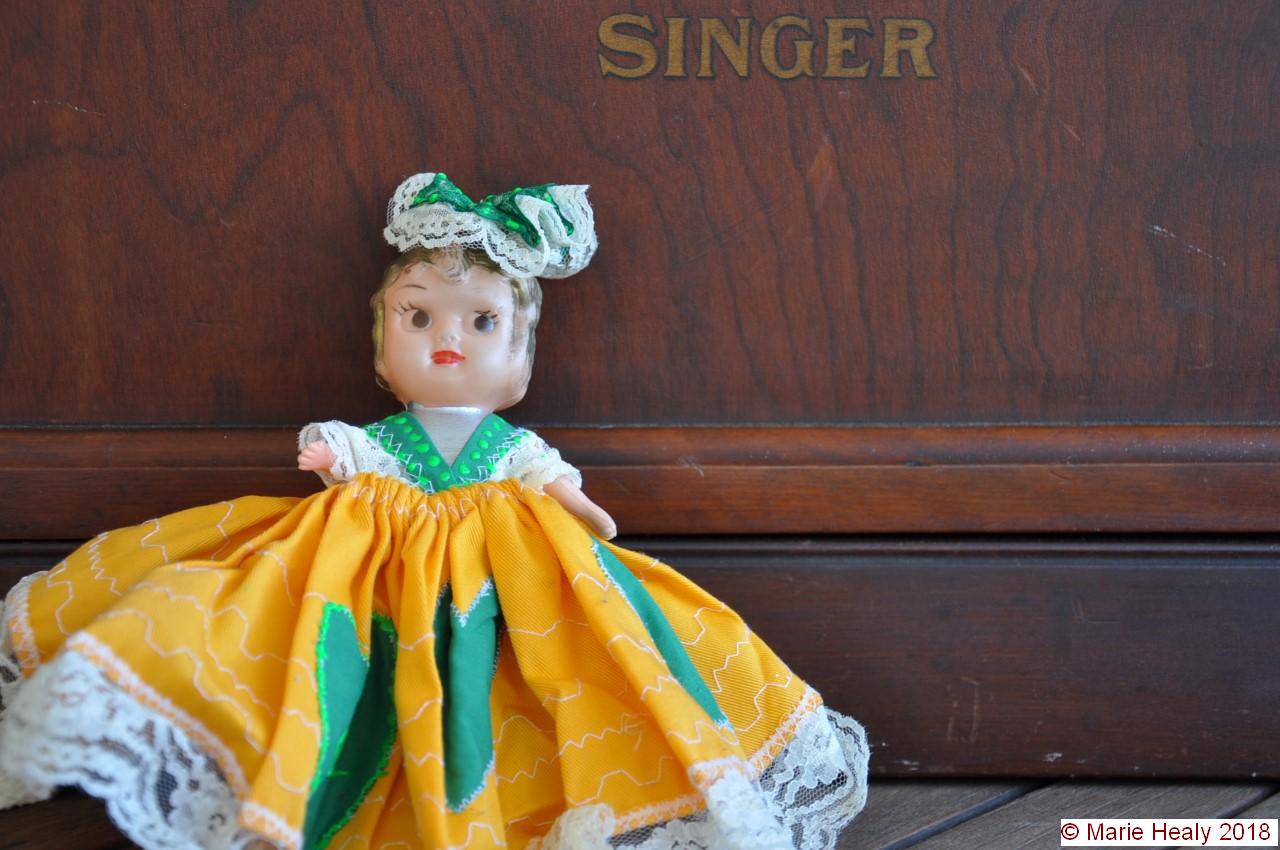 Kewpie Doll in Green and Gold